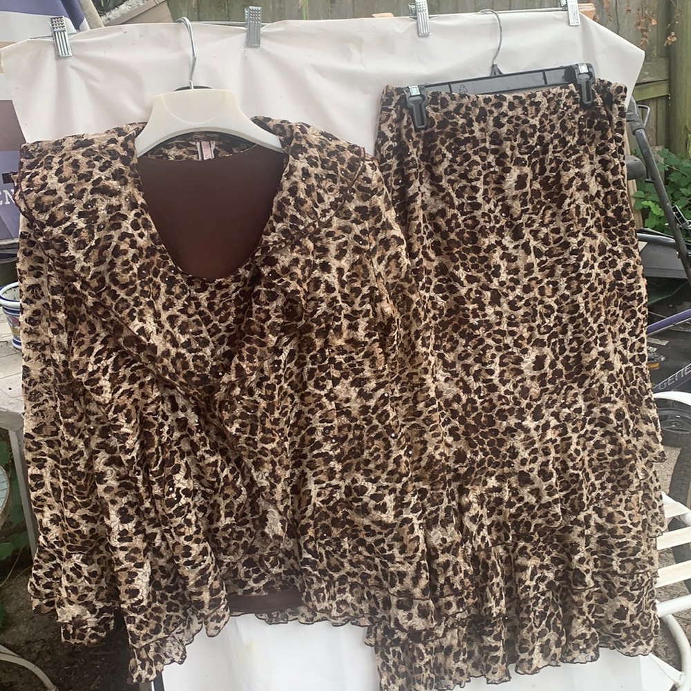 Seven karat 3 piece skirt suit